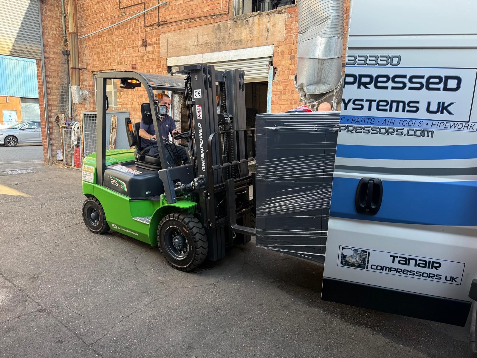 Tanair 22 kW VSD compressor being unloaded for installation at Arcadian Products